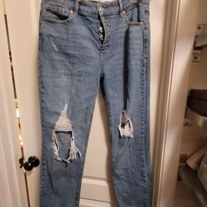 Button fly distressed jeans